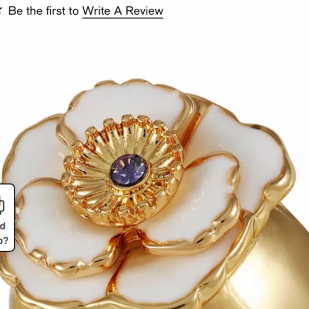 Gold tone flower ring